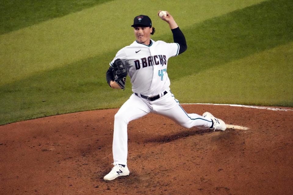 Aug 9, 2022; Phoenix, Arizona, USA; Arizona Diamondbacks starting pitcher Tommy Henry (47) pitches against the Pittsburgh Pirates during the sixth inning at Chase Field. Mandatory Credit: Joe Camporeale-USA TODAY Sports