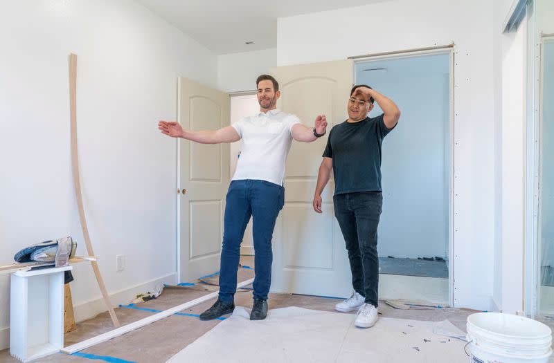 HGTV's Flipping 101, host Tarek El Moussa coaches a first-time home flipper in a mid-renovation bedroom, in La Mirada