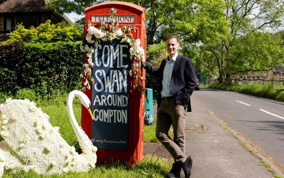 The Chancellor Jeremy Hunt in the village of Compton, Surrey, part of his constituency to start canvasing ahead of the General Election.