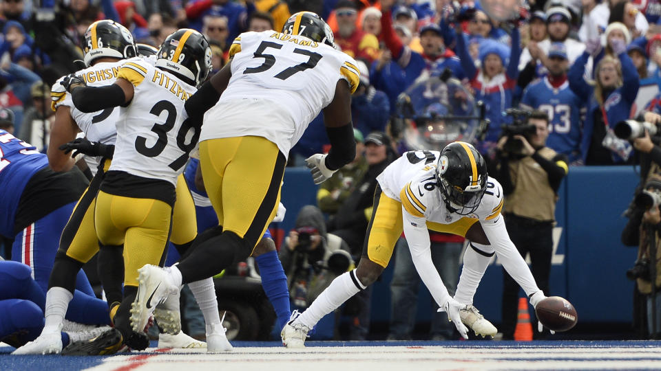 Pittsburgh Steelers cornerback Josh Jackson recovers a fumble by Buffalo Bills tight end Quintin Morris during the second half of an NFL football game in Orchard Park, N.Y., Sunday, Oct. 9, 2022. (AP Photo/Adrian Kraus)