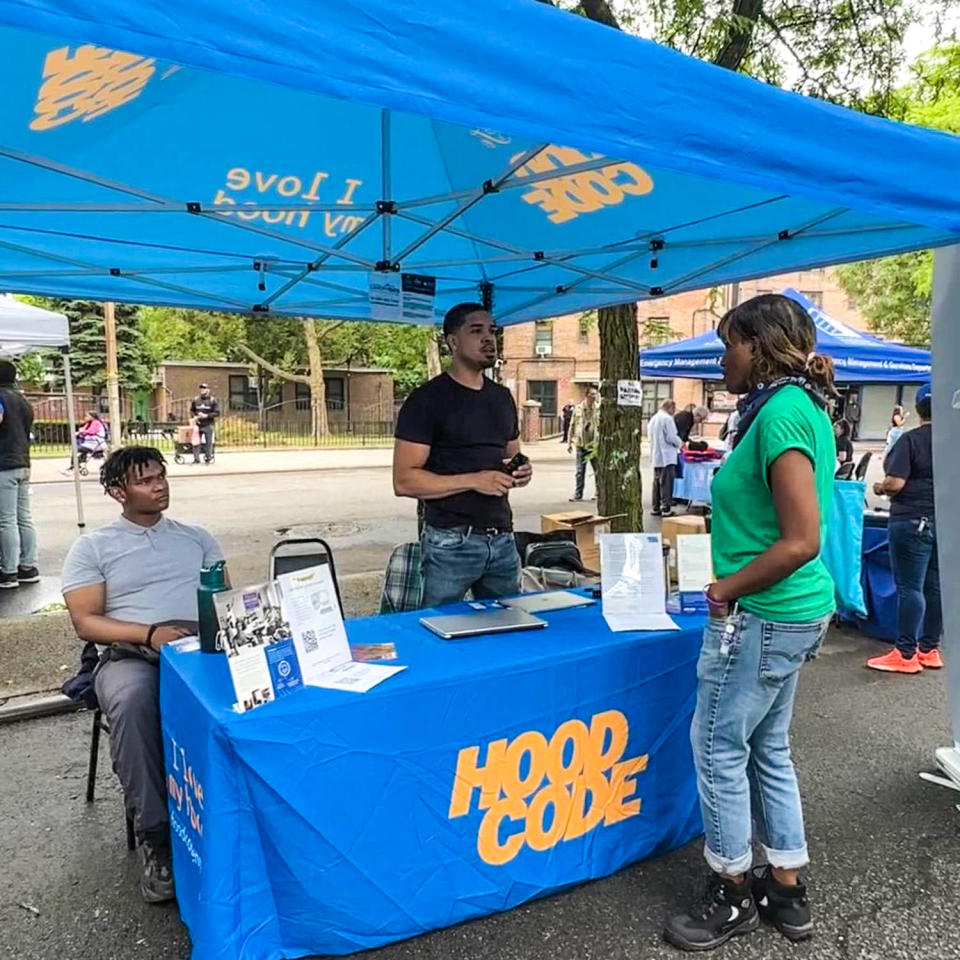 Jason Gibson at community event recruiting students and tutors for Hood Code. (Courtesy Jason Gibson)