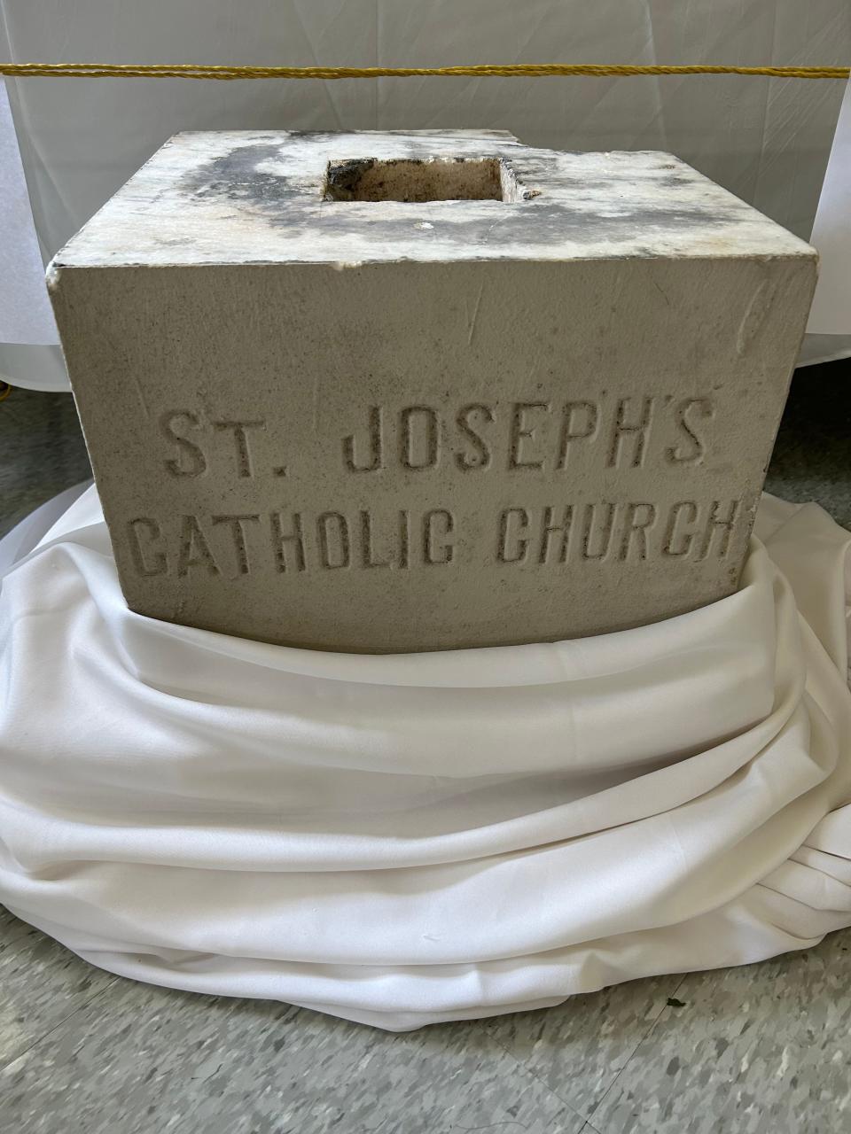A nickel from 1912 was found inside of St. Joseph’s cornerstone, both of which are on display in a retrospective gallery at the church on Epps Bridge Parkway.