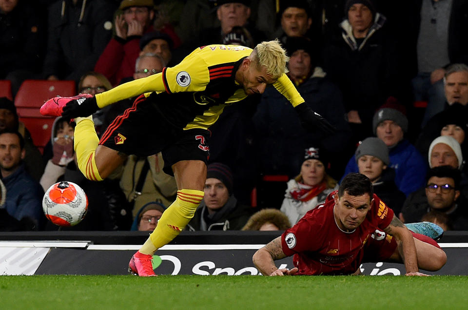 WATFORD, ENGLAND - FEBRUARY 29: (THE SUN OUT, THE SUN ON SUNDAY OUT) Watford's Roberto Pereyra competing with Dejan Lovren of Live during the Premier League match between Watford FC and Liverpool FC at Vicarage Road on February 29, 2020 in Watford, United Kingdom. (Photo by John Powell/Liverpool FC via Getty Images)