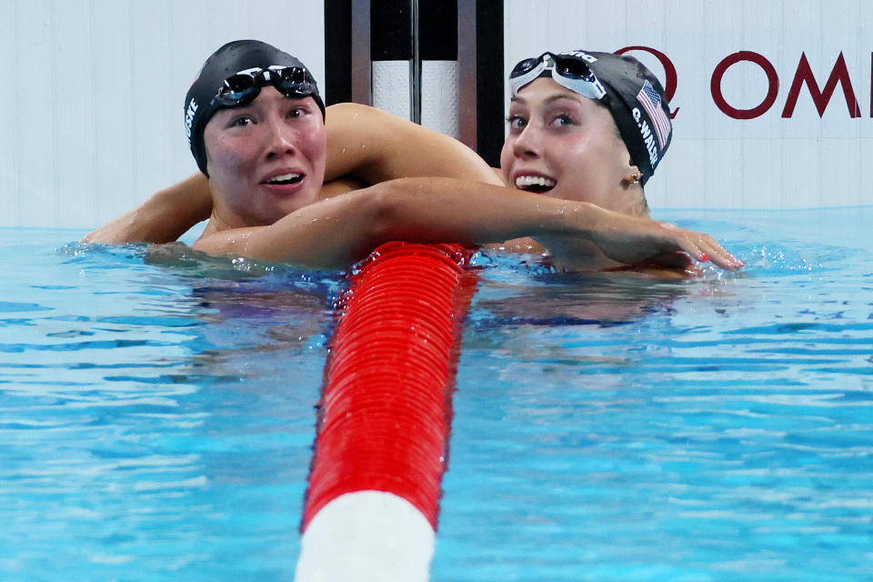 NANTERRE, FRANCE - JULY 28: Team US's Tori Huske and Gretchen Walsh celebrate after winning the gold and silver medals in the women's 100m butterfly final during day two of the Paris 2024 Olympic Games at Paris La Defense Arena in Nanterre, France on July 28, 2024. (Photo by Clive Rose/Getty Images)