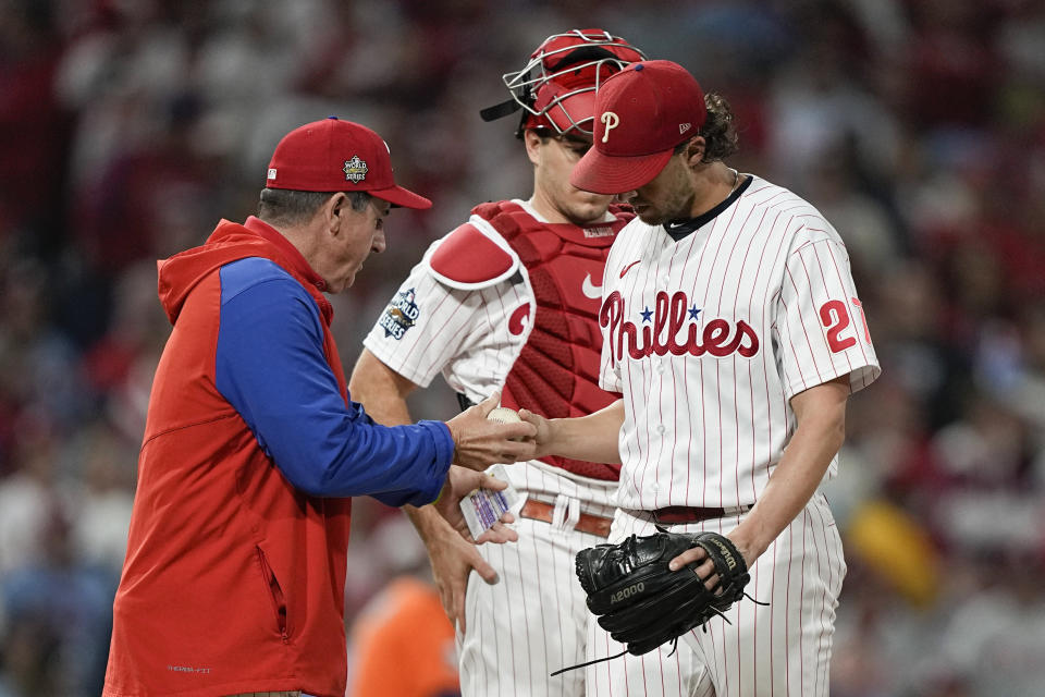 Philadelphia Phillies starting pitcher Aaron Nola leaves the game with bases loaded during the fifth inning in Game 4 of baseball's World Series between the Houston Astros and the Philadelphia Phillies on Wednesday, Nov. 2, 2022, in Philadelphia. (AP Photo/David J. Phillip)