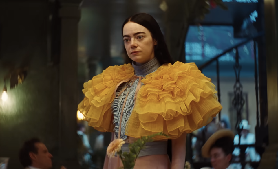 Close-up of Emma in a huge, frilly collar