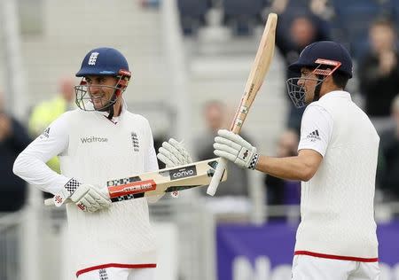 Britain Cricket - England v Sri Lanka - Second Test - Emirates Durham ICG - 30/5/16 England's Alastair Cook celebrates reaching 10,000 test runs Action Images via Reuters / Jason Cairnduff Livepic