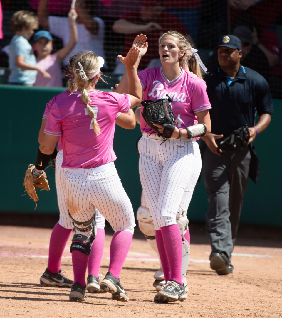 May 7, 2022; Tuscaloosa, AL, USA;  Montana Fouts gives high fives to teammates after coming in to pitch in relief and get the win over Missouri in Rhoads Stadium Saturday. The Crimson Tide defeated Missouri 3-1 in game two of the weekend series. Mandatory Credit: Gary Cosby Jr.-The Tuscaloosa News