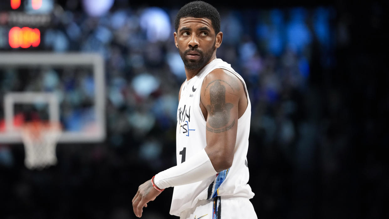 Brooklyn Nets guard Kyrie Irving during the first half of an NBA basketball game against the New York Knicks, Saturday, Jan. 28, 2023, in New York. (AP Photo/Mary Altaffer)