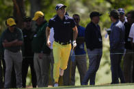 Justin Thomas runs out to check on his second shot during the final round at the Masters golf tournament on Sunday, April 10, 2022, in Augusta, Ga. (AP Photo/Jae C. Hong)