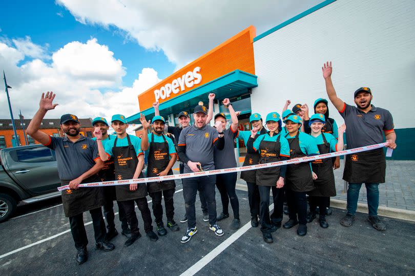 Staff at the new Popeyes store