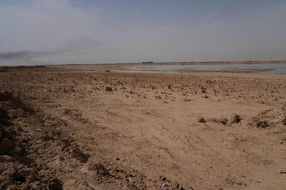 A general view of the dried up Lake Sawa Iraq, is seen Saturday, June 4, 2022. This year, for the first time in its centuries-long history, Sawa Lake dried up completely. A combination of mismanagement by local investors, government neglect and climate change has ground down its azure shores to chunks of salt. (AP Photo/Hadi Mizban)