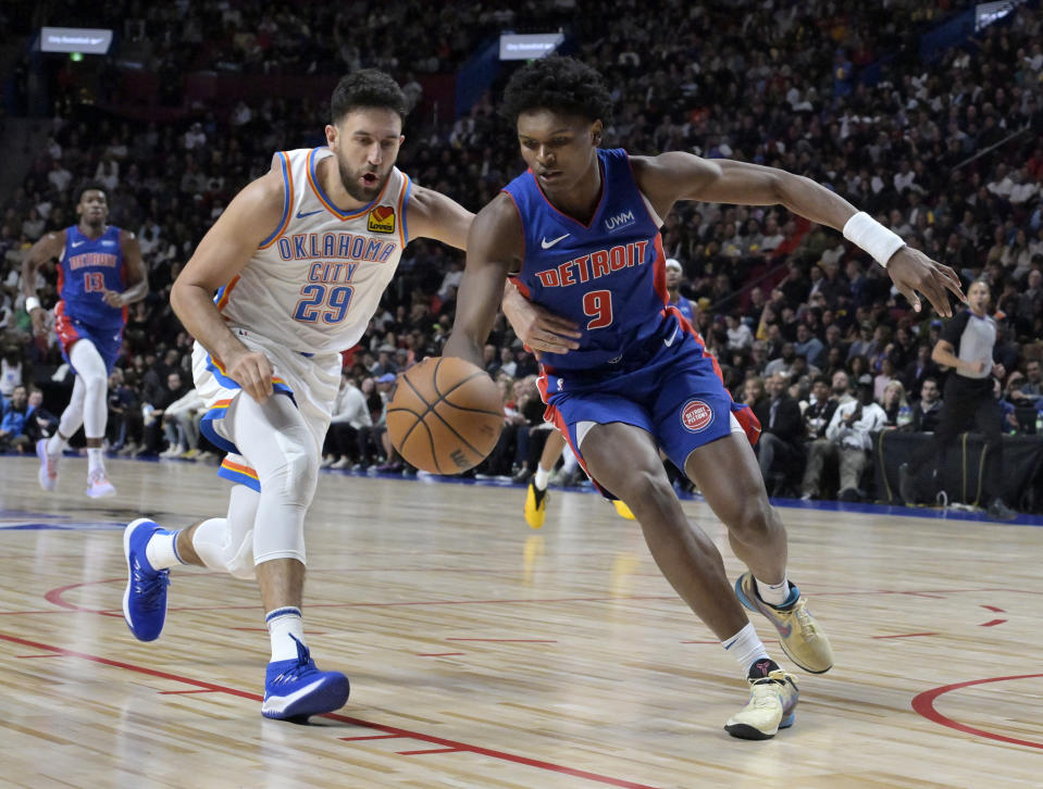 Oct 12, 2023; Montreal, Quebec, CAN; Detroit Pistons guard <a class="link " href="https://sports.yahoo.com/nba/players/6675" data-i13n="sec:content-canvas;subsec:anchor_text;elm:context_link" data-ylk="slk:Zavier Simpson;sec:content-canvas;subsec:anchor_text;elm:context_link;itc:0">Zavier Simpson</a> (9) plays the ball and Oklahoma City Thunder guard Vasilije Micic (29) defends during the fourth quarter at the Bell Centre. Mandatory Credit: Eric Bolte-USA TODAY Sports