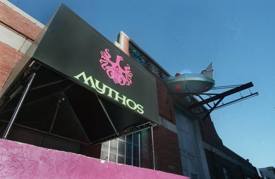 In December 1999, a flying saucer appears to have crashed into the facade of Mythos in uptown Charlotte.