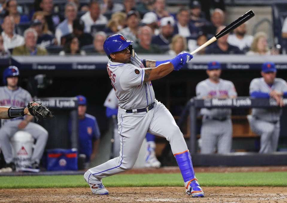 New York Mets' Yoenis Cespedes connects for a base hit against the New York Yankees during the sixth inning of a baseball game, Friday, July 20, 2018, in New York. (AP Photo/Julie Jacobson)