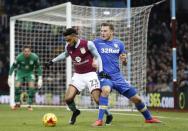 Britain Football Soccer - Aston Villa v Leeds United - Sky Bet Championship - Villa Park - 29/12/16 Leeds' Chris Wood in action with Aston Villa's Jordan Amavi Mandatory Credit: Action Images / Carl Recine Livepic