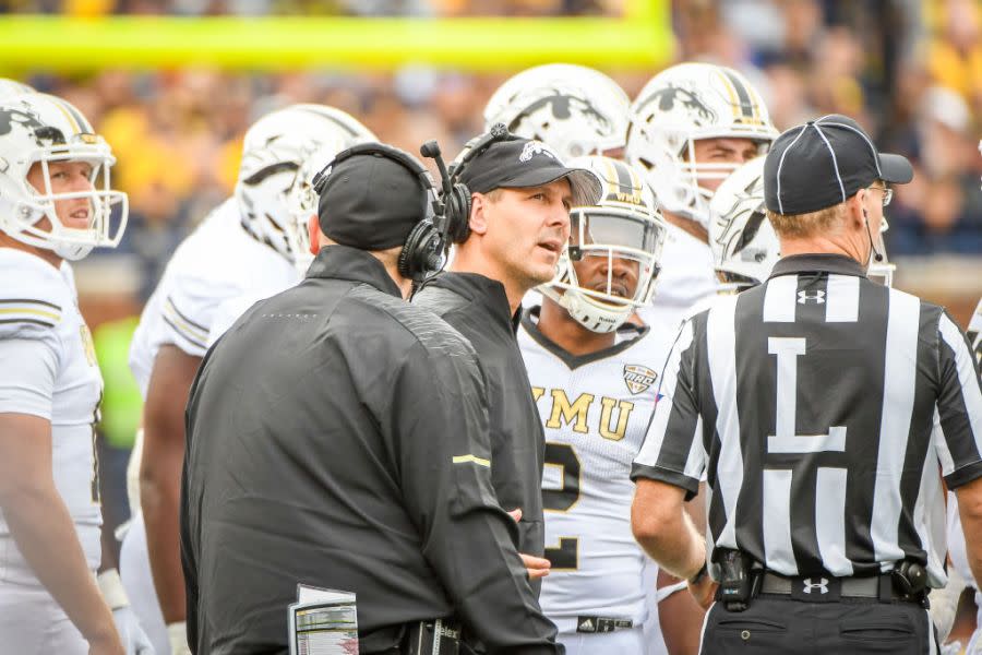 Western Michigan Broncos head coach Tim Lester talk to the referees during a timeout during the Michigan Wolverines versus Western Michigan Broncos game on Saturday September 8, 2018 at Michigan Stadium in Ann Arbor, MI. (Photo by Steven King/Icon Sportswire via Getty Images)