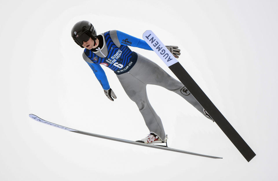 FILE - Casey Larson soars through the air during the men's ski jumping competition for placement on the 2022 U.S. Olympic team at the Olympic Ski Jumping Complex, on Dec. 25, 2021, in Lake Placid, N.Y. Ski jumpers tend to be tall and slender, taking advantage of their height to have longer skis and lighter weight to avoid a losing battle with physics. (AP Photo/Hans Pennink, File)