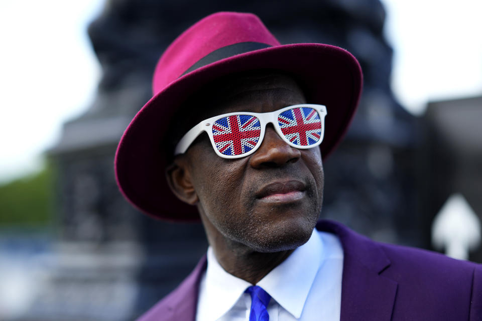 A man walks in a queue to pay his respect to the late Queen Elizabeth II during the lying-in-state, in Westminster Hall in London, Thursday, Sept. 15, 2022. The Queen will lie in state in Westminster Hall for four full days before her funeral on Monday Sept. 19.(AP Photo/Petr David Josek)