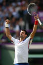 LONDON, ENGLAND - AUGUST 01: Novak Djokovic of Serbia celebrates after defeating Lleyton Hewitt of Australia in the third round of Men's Singles Tennis on Day 5 of the London 2012 Olympic Games at Wimbledon on August 1, 2012 in London, England. (Photo by Clive Brunskill/Getty Images)