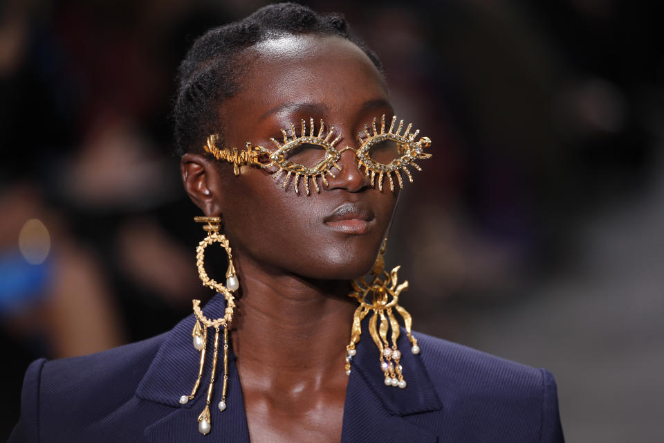 A model wears a creation for Schiaparelli Haute Couture Spring/Summer 2020 fashion collection presented Monday Jan.20, 2020 in Paris (AP Photo/Francois Mori)