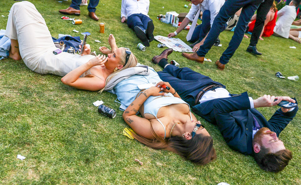 Punters laying down on Melbourne Cup day.