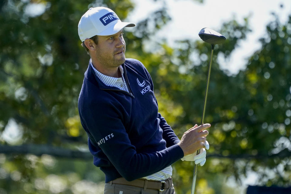 Harris English, of the United States, plays his shot from the second tee during the third round of the US Open Golf Championship, Saturday, Sept. 19, 2020, in Mamaroneck, N.Y. (AP Photo/Charles Krupa)