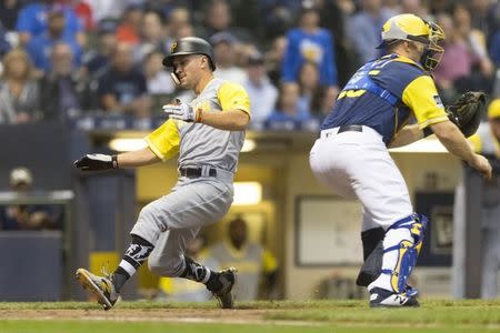 Brewers rally from five runs down to beat Yankees 7-6