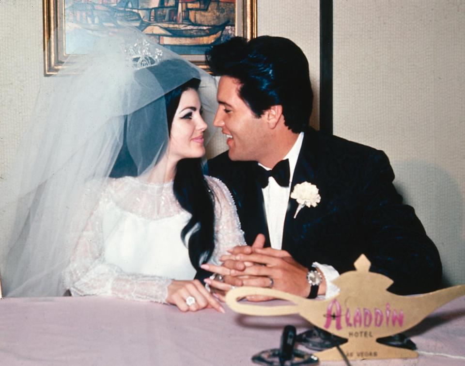 Priscilla and Elvis at their wedding in 1967 (AP)