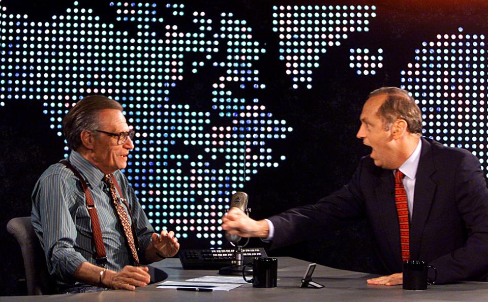 Democratic presidential hopeful Bill Bradley, right, makes a point to Larry King during taping of "Larry King Live" Tuesday, Sept. 28, 1999, at CNN studios in Los Angeles. Bradley, who called health care coverage an unalienable right as much as the guarantees of "life, liberty and pursuit of happiness" would allow Americans to enroll in the same health care coverage provided for members of Congress and federal employees, potentially exploding the size of the Federal Employees Health Benefits Program.(AP Photo/Damian Dovarganes)