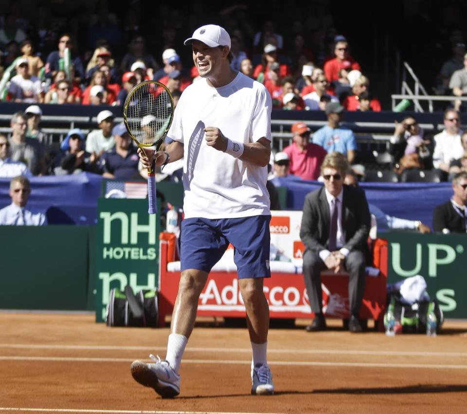 Bob Bryan reacts to winning a point against the British team during a doubles match at the Davis Cup tennis matches, Saturday, Feb. 1, 2014, in San Diego. (AP Photo/Lenny Ignelzi)