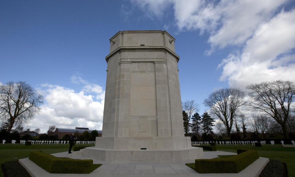 In this photo taken on Monday, March, 24, 2014, World War One graves surround the chapel at the Flanders Field American Cemetery in Waregem, Belgium on Monday, March 24, 2014. The cemetery contains the remains of 368 U.S. WWI military and support personnel. Of those remains, 21 are unknown and could not be identified. On Wednesday, March 26, 2014 President Barack Obama will honor those Americans who died in a struggle so all-encompassing, so horrific, it simply became known as the Great War. (AP Photo/Virginia Mayo)