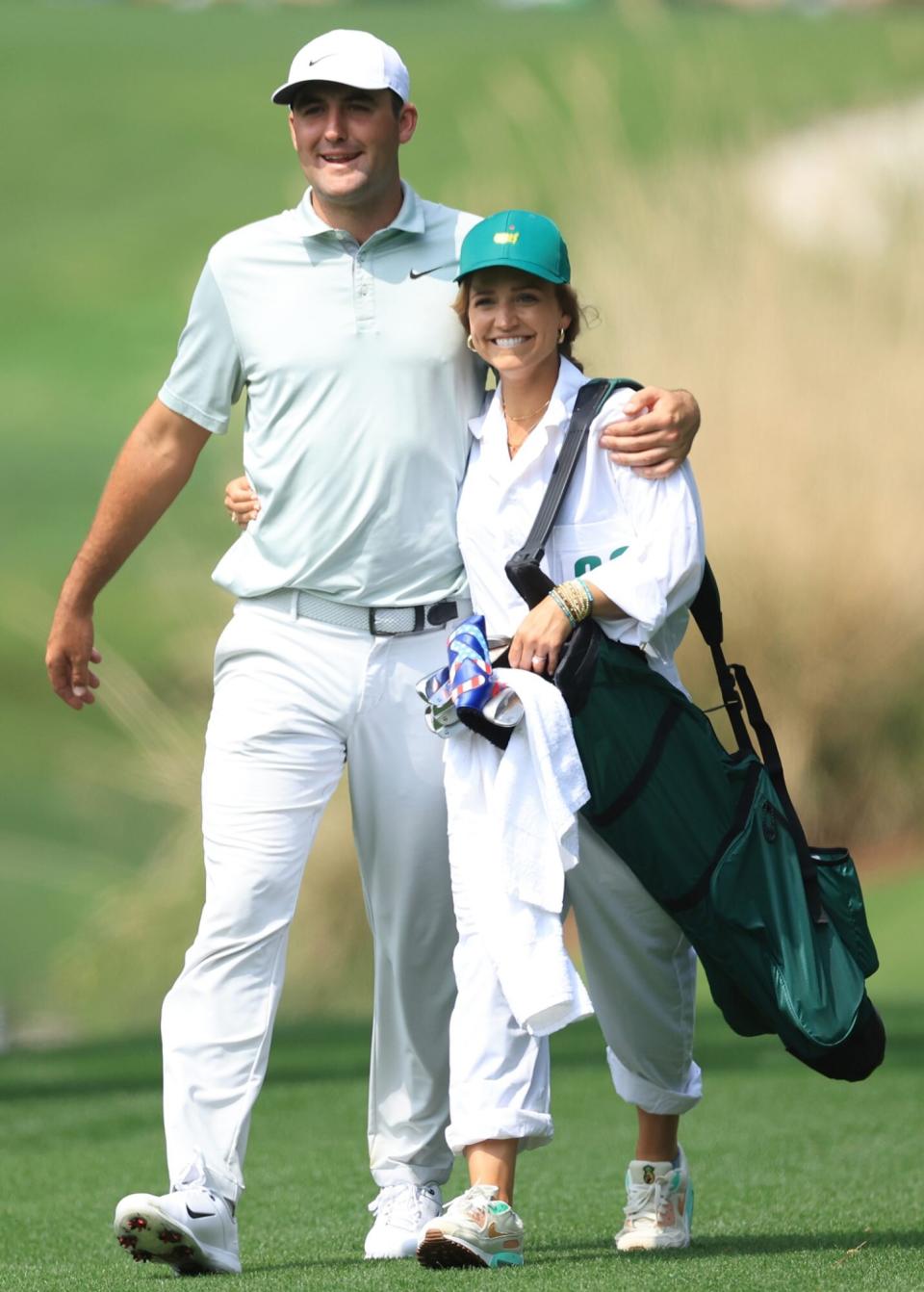 Scottie Scheffler of the United States and wife Meredith Scudder during the Par Three Contest prior to the Masters at Augusta National Golf Club on April 06, 2022 in Augusta, Georgia
