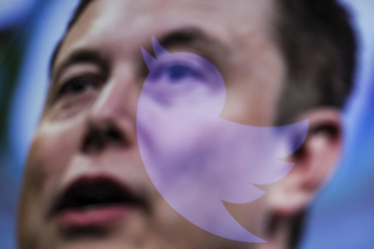 In this photo illustration, the image of Elon Musk is displayed on a computer screen and the logo of twitter is reflected in Ankara, Turkiye on October 06, 2022.
