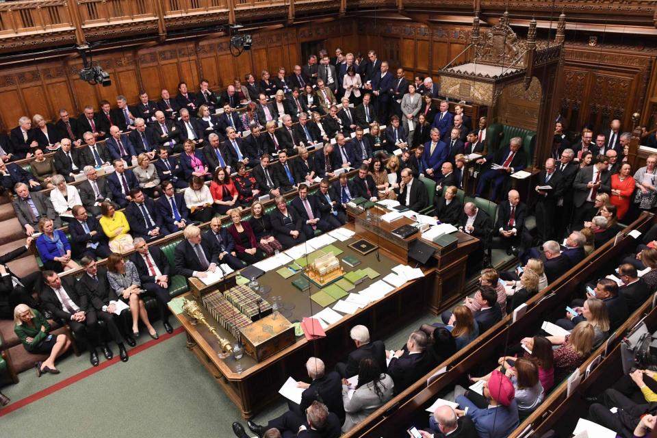 MPs in the House of Commons (UK PARLIAMENT/AFP via Getty Imag)