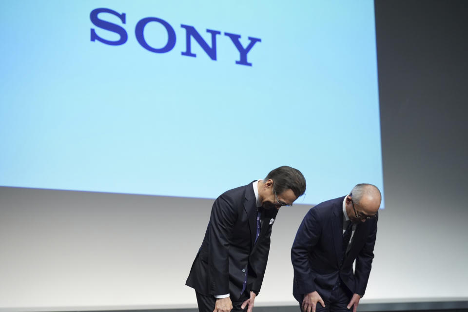 Hiroki Totoki, right, the Chief Financial Officer, who will become the new president and COO, Sony Corp. and Kenichiro Yoshida, left, chief executive officer of Sony Corp. bow after a press conference Thursday, Feb. 2, 2023, in Tokyo. (AP Photo/Eugene Hoshiko)