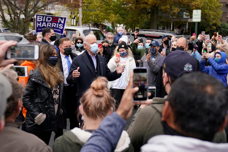 Democratic presidential candidate former Vice President Joe Biden speaks with supporters as he visits Hank's Hoagies in Scranton, Pa., on Election Day,  Nov. 3, 2020.