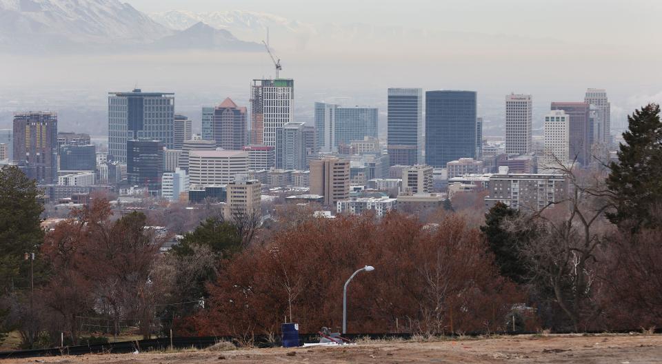 The Salt Lake City skyline Wednesday, Jan. 3, 2024. The lack of accumulated snow in Utah mountains compared to last winter is concerning to officials. | Jeffrey D. Allred, Deseret News