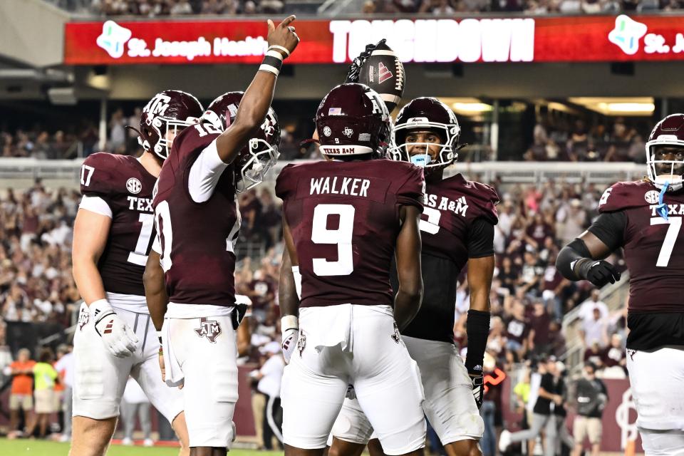 Texas A&M Aggies wide receiver Jahdae Walker (9) celebrates with teammates after scoring a touchdown in the third quarter Sept. 21, 2024 against the Bowling Green Falcons in College Station.