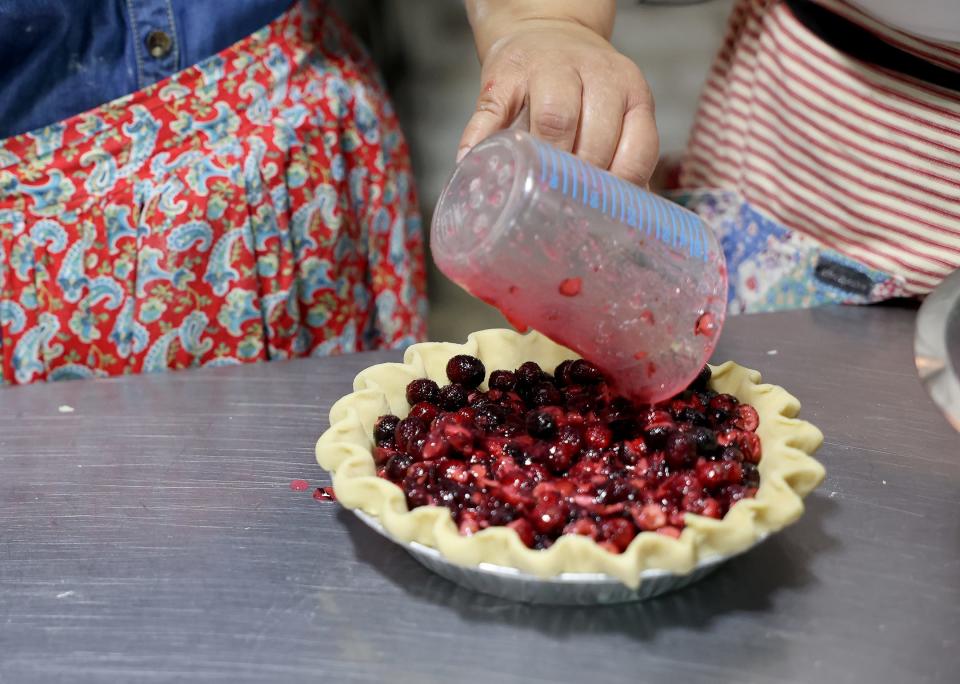 About 4 cups of the cranberry filling is added to the made-from-scratch pie crust.