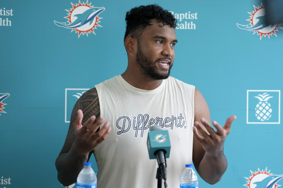 Miami Dolphins quarterback Tua Tagovailoa speaks during an interview following practice at the NFL football team's training facility, Wednesday, July 26, 2023, in Miami Gardens, Fla. (AP Photo/Lynne Sladky)
