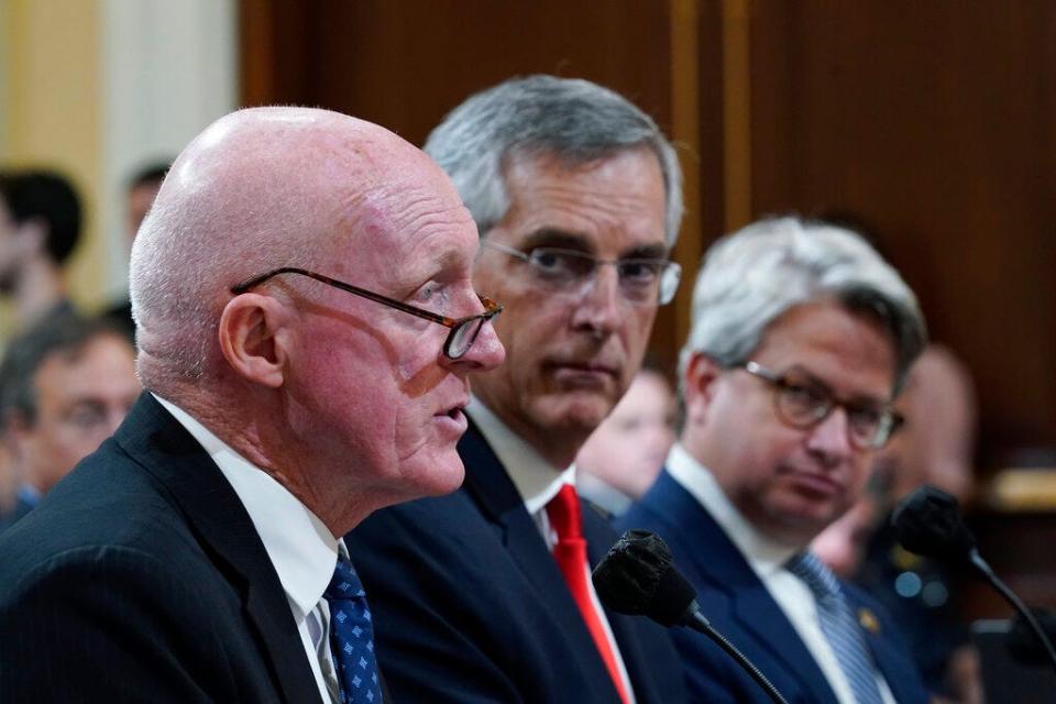 Arizona House Speaker Rusty Bowers testifies as the House select committee investigating the Jan. 6 attack on the U.S. Capitol continues to reveal its findings of a year-long investigation, at the Capitol in Washington on June 21, 2022. Georgia Secretary of State Brad Raffensperger and Georgia Deputy Secretary of State Gabriel Sterling look on.