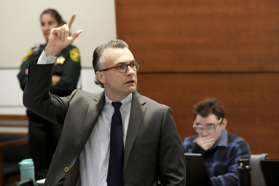 Capital defense attorney Casey Secor motions in court during the penalty phase of the trial of Marjory Stoneman Douglas High School shooter Nikolas Cruz at the Broward County Courthouse in Fort Lauderdale, Fla., Monday, Aug. 29, 2022. Cruz previously plead guilty to all 17 counts of premeditated murder and 17 counts of attempted murder in the 2018 shootings. (Amy Beth Bennett/South Florida Sun Sentinel via AP, Pool)