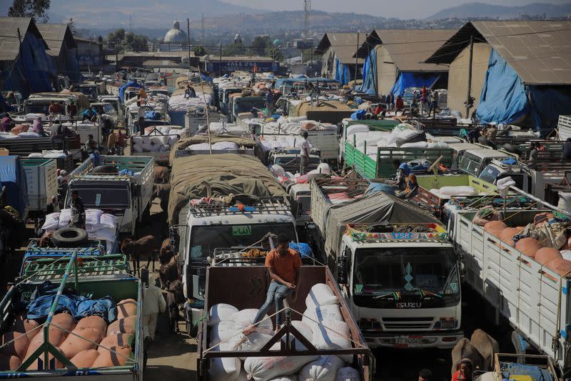 View shows trucks queuing with sacks of grains at the grain market in Merkato neighbourhood of Addis Ababa