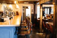 <p>If you're hankering after a cosy country pub experience with an elevated menu and chic interiors, you've come to the right place. The Bull at Ditchling dates back to 1560 and is bursting with character thanks to the wonky ceilings and old wooden beams.</p><p>This gastropub-style restaurant with rooms attracts arty types as well as foodies, and offers fine ales from its own Bedlam Brewery. Sitting in the South Downs National Park, it offers wonderful opportunities for country and coastal walks, being just a 20-minute drive from the seaside at Brighton.</p><p>And, when you're back from your stroll, you can tuck into British pub classics with a modern twist. There's nothing like fish covered in delicious ale-infused batter.</p><p><a href="https://www.goodhousekeepingholidays.com/offers/east-sussex-ditchling-bull-hotel" rel="nofollow noopener" target="_blank" data-ylk="slk:Read our review of The Bull.;elm:context_link;itc:0;sec:content-canvas" class="link ">Read our review of The Bull.</a></p><p><a class="link " href="https://go.redirectingat.com?id=127X1599956&url=https%3A%2F%2Fwww.booking.com%2Fhotel%2Fgb%2Fthe-bull-ditchling.en-gb.html%3Faid%3D1922306%26label%3Drestaurants-with-rooms&sref=https%3A%2F%2Fwww.redonline.co.uk%2Ftravel%2Finspiration%2Fg35725040%2Frestaurants-with-room1%2F" rel="nofollow noopener" target="_blank" data-ylk="slk:CHECK AVAILABILITY;elm:context_link;itc:0;sec:content-canvas">CHECK AVAILABILITY</a></p>