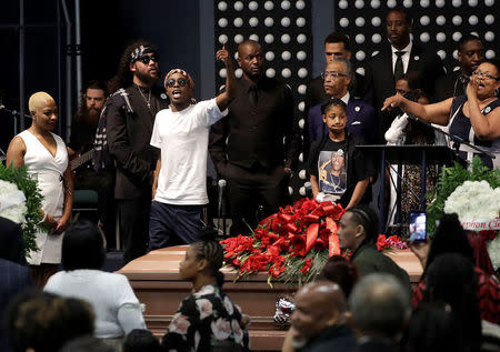 Stevante Clark gestures during the funeral services for police shooting victim Stephon Clark at Bayside Of South Sacramento Church in Sacramento, California, U.S., March 29, 2018. Jeff Chiu/Pool via Reuters