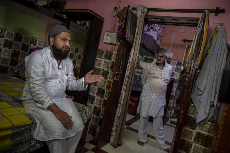 Haroon, who saw his 32 year-old brother being shot and killed by his Hindu neighbors during the February 2020 communal riots, speaks to the Associated Press inside his home in North Ghonda, one of the worst riot affected neighborhood, in New Delhi, India, Friday, Feb. 19, 2021. As the first anniversary of bloody communal riots that convulsed the Indian capital approaches, Muslim victims are still shaken and struggling to make sense of their struggle to seek justice. (AP Photo/Altaf Qadri)