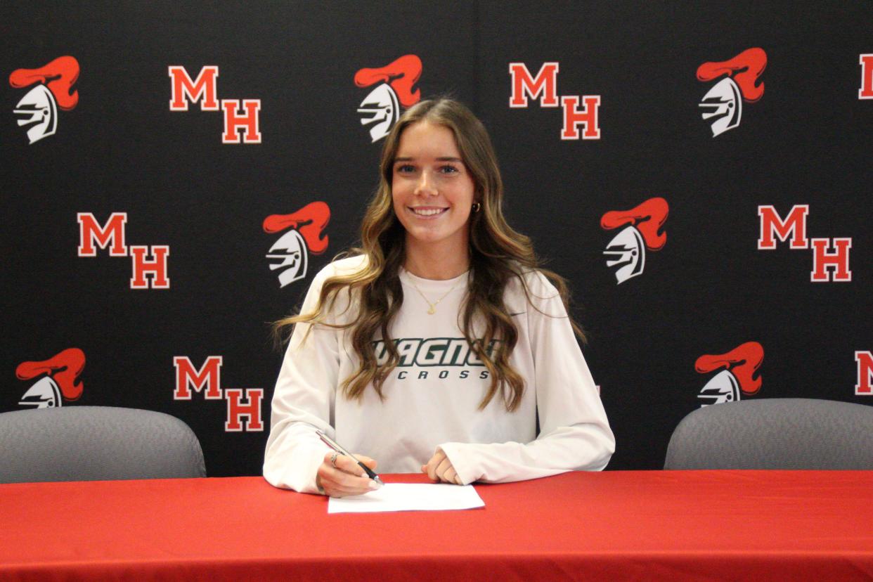 Morris Hills senior Sydney Mulroony signed a National Letter of Intent to continue her academic and lacrosse careers at Wagner on Nov. 8, 2023.