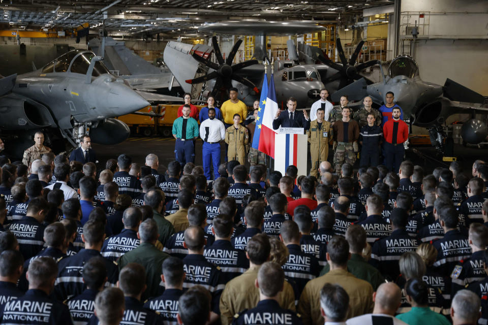 French president Emmanuel Macron delivers a speech aboard the French aircraft carrier Charles de Gaulle, sailing between the Suez canal and the Red Sea on december 19, 2022. - French President Emmanuel Macron joined the French aircraft carrier Charles de Gaulle on December 19, 2022 for the traditional Christmas party with the troops, before attending a regional conference in Jordan on December 20, the Elysee presidential palace announced. (Photo by Ludovic MARIN / POOL / AFP) / SOLELY FOR SIPA AND ABACA