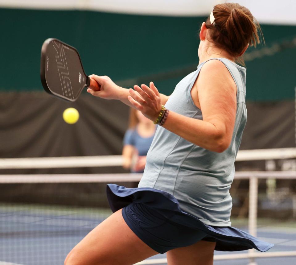 Colleen Durno returns a forehand during the Brown Billone Club Pickleball Classic in Easton on Saturday, Feb. 18, 2023.